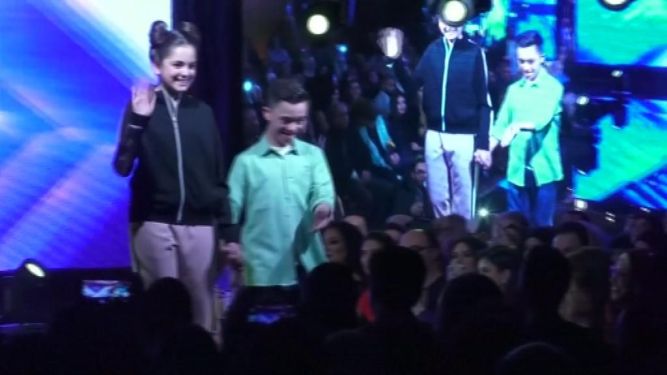 أطفال مصابون بمتلازمة داون يبهرون الجمهور في عرض ازياء بسوريا