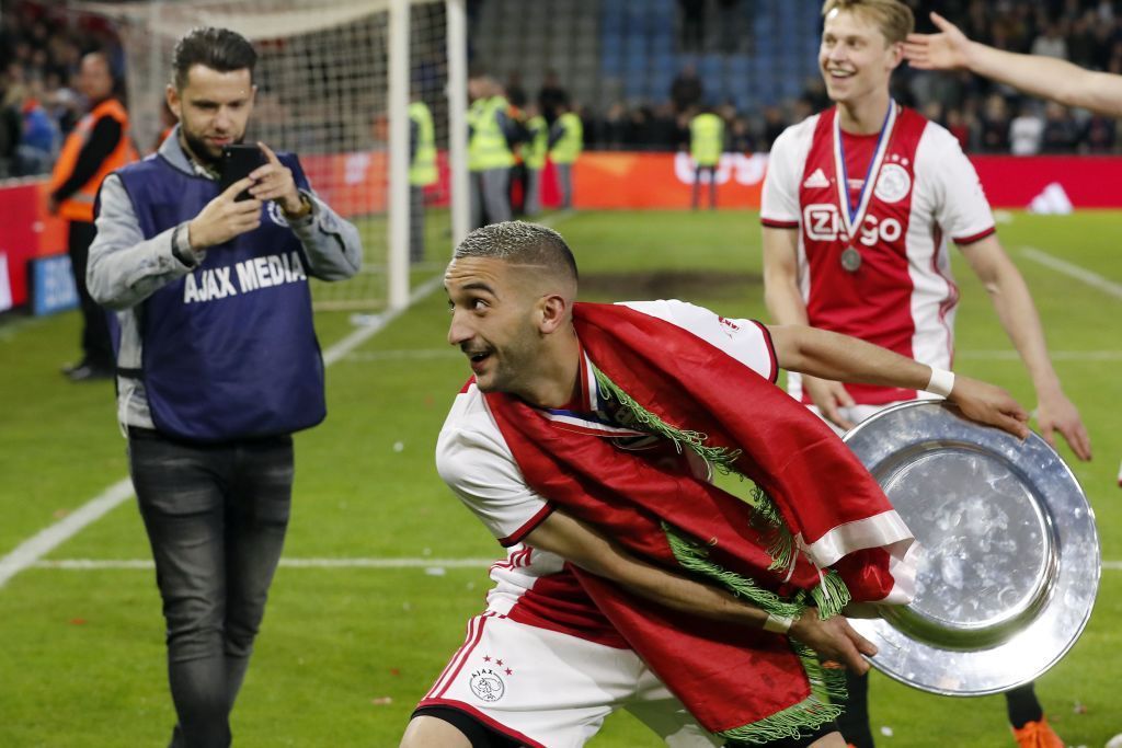 Hakim Ziyech of Ajax with the Dutch Eredivisie trophy, dish during the Dutch Eredivisie match between De Graafschap Doetinchem and Ajax Amsterdam at De Vijverberg stadium on May 15, 2019 in Doetinchem, The Netherlands(Photo by VI Images via Getty Images)