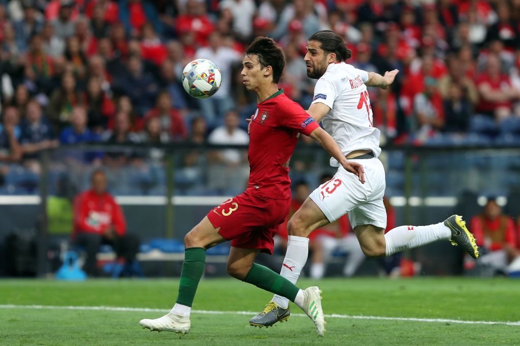 PORTO, PORTUGAL - JUNE 5: Portugal's forward Joao Felix (L) vies with Switzerland's defender Ricardo Rodriguez during the UEFA Nations League Semi-Final football match Portugal vs Switzerland, at the Dragao stadium, on June 5, 2019 in Porto, Portugal. (Photo by Pedro Fiúza/NurPhoto via Getty Images)