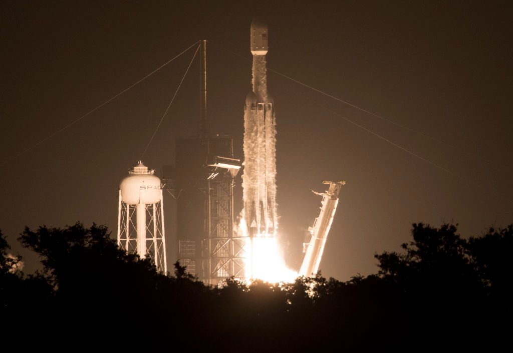 CAPE CANAVERAL, FL - JUNE 25: In this handout image provided by NASA, A SpaceX Falcon Heavy rocket carrying 24 satellites as part of the Department of Defense's Space Test Program-2 (STP-2) mission launches from Launch Complex 39A, Tuesday, June 25, 2019 at NASA's Kennedy Space Center in Florida. Four NASA technology and science payloads which will study non-toxic spacecraft fuel, deep space navigation, "bubbles" in the electrically-charged layers of Earth's upper atmosphere, and radiation protection for satellites are among the two dozen satellites that will be put into orbit. (Photo by Joel Kowsky/NASA via Getty Images)