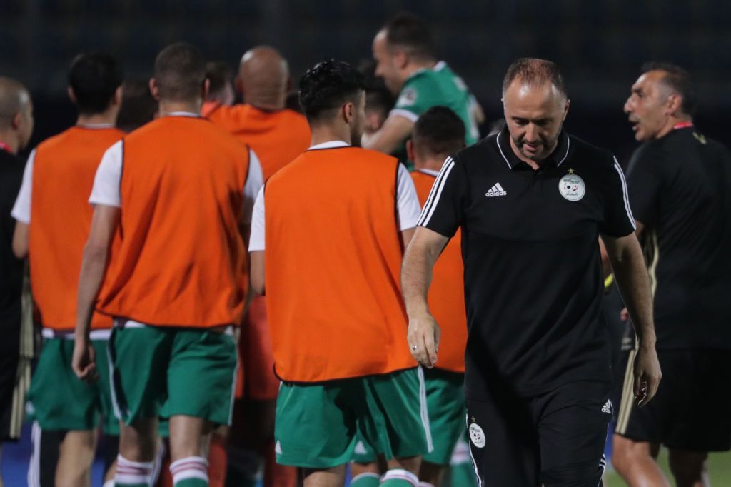 27 June 2019, Egypt, Cairo: Algeria's manager Djamel Belmadi (2-R) reacts after his team's first side's goal during the 2019 Africa Cup of Nations Group C soccer match between Senegal and Algeria at the 30 June Stadium. Photo: Oliver Weiken/dpa (Photo by Oliver Weiken/picture alliance via Getty Images)