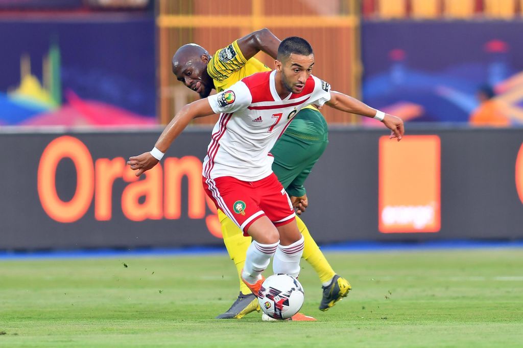 CAIRO, EGYPT - JULY 01: Hakim Ziyech of Morocco with Sifiso Hlanti of South Africa during the African Cup of Nations match between South Africa and Morocco at Al-Salam Stadium on July 01, 2019 in Cairo, Egypt. (Photo by Ahmed Hasan/Gallo Images/Getty Images)