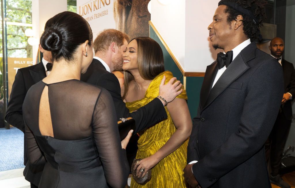 LONDON, ENGLAND - JULY 14: Prince Harry, Duke of Sussex and Meghan, Duchess of Sussex greet US singer-songwriter Beyoncé and and US rapper Jay-Z at the European Premiere of Disney's "The Lion King" at Odeon Luxe Leicester Square on July 14, 2019 in London, England. (Photo by Niklas Halle'n-WPA Pool/Getty Images)
