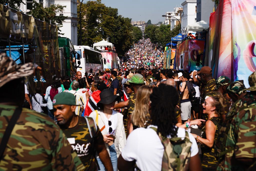 LONDON, UNITED KINGDOM - 2019/08/25: Revelers pack Ladbroke Grove during the opening day of the 2019 Notting Hill Carnival. Up to a million people are expected to pack the streets of Notting Hill and surrounding areas over the course of the two day event. The annual celebration of Afro-Caribbean culture takes place each August bank holiday weekend. (Photo by David Cliff/SOPA Images/LightRocket via Getty Images)