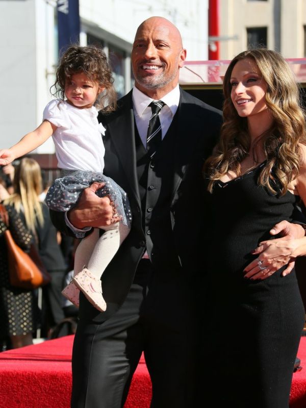LOS ANGELES, CA - DECEMBER 13: Dwayne Johnson, Lauren Hashian and daughter Jasmine Johnson attend a ceremony honoring him with a star on The Hollywood Walk of Fame on December 13, 2017 in Los Angeles, California.(Photo by JB Lacroix/ WireImage)