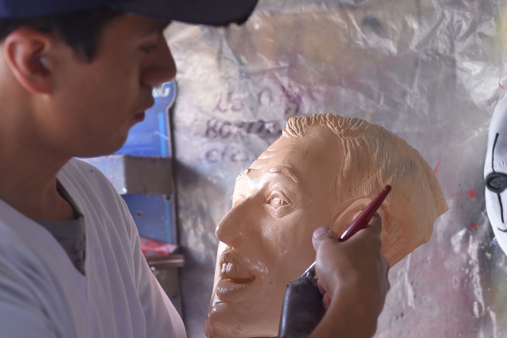 MEXICO CITY, MEXICO - MAY 02: A works on a mask of Mexico presidential candidate Jose Antonio Meade at a small latex factory located in Iztapalapa on May 02, 2018 in Mexico City, Mexico. The factory 'Cripta más Feroz'  produces around 100 thousand masks annually. (Photo by Carlos Tischler/Getty Images)