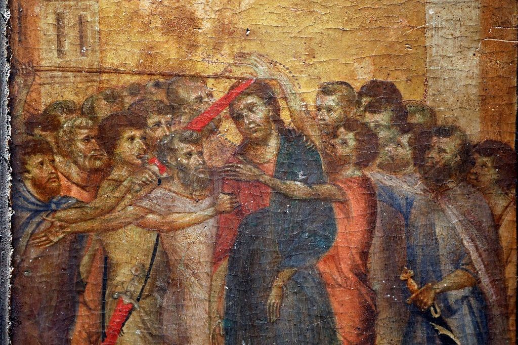 A part of the painting "Christ Mocked", a long-lost masterpiece by Florentine Renaissance artist Cimabue in the late 13th century, which was found months ago hanging in an elderly woman's kitchen in the town of Compiegne, is seen in Paris, France, September 24, 2019. REUTERS/Charles Platiau