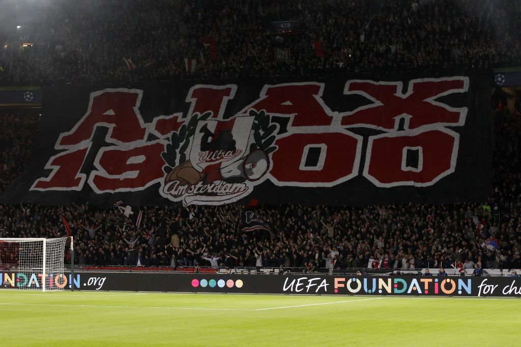 "الألتراس" قواعد جماهيرية ضخمة ولوحات فنية تزين ملاعب كرة القدم.. ولكن! 3 banner Ajax ultras 1900, fans of Ajax during the UEFA Champions League group E match between Ajax Amsterdam and SL Benfica at the Johan Cruijff Arena on October 23, 2018 in Amsterdam, The Netherlands