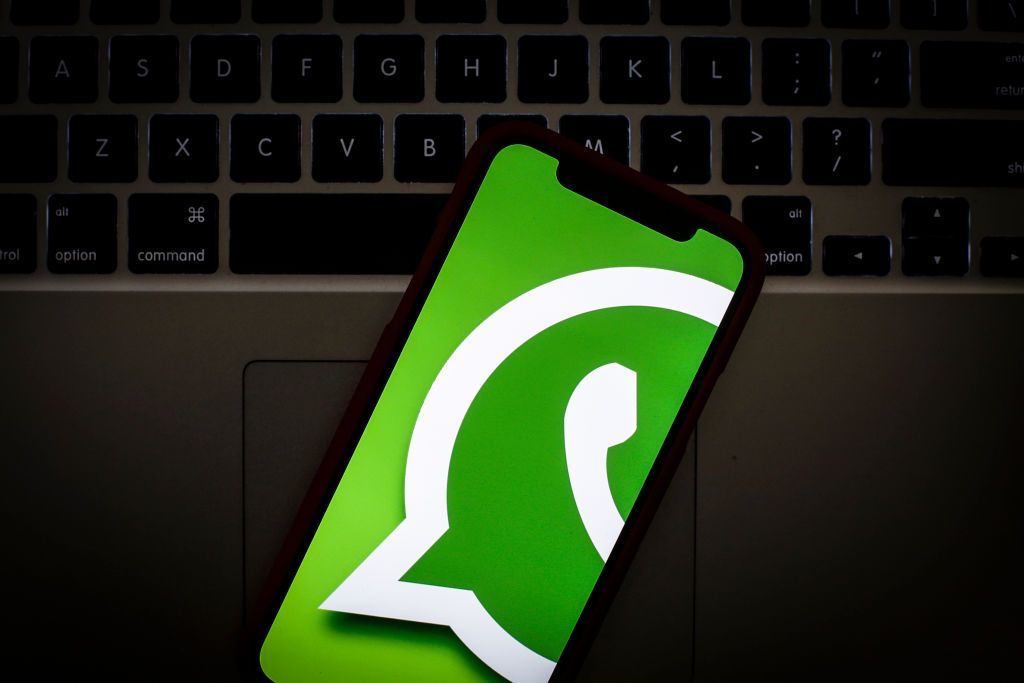 The WhatsApp logo is seen on a portable mobile device in this photo illustration on January 22, 2019. (Photo by Jaap Arriens/NurPhoto via Getty Images)