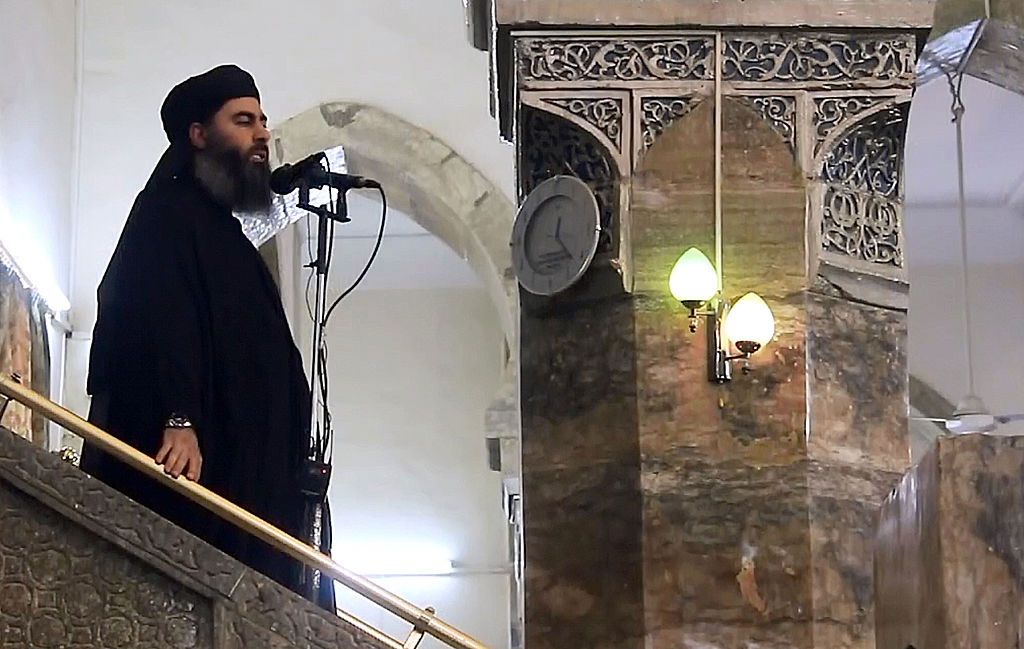 MOSUL, IRAQ - JULY 5 : An image grab taken from a video released on July 5, 2014 by Al-Furqan Media shows alleged Islamic State of Iraq and the Levant (ISIL) leader Abu Bakr al-Baghdadi preaching during Friday prayer at a mosque in Mosul.(Photo by Al-Furqan Media/Anadolu Agency/Getty Images)