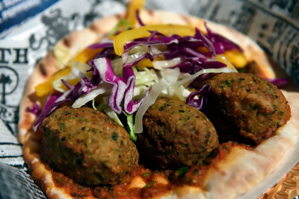 ANAHEIM, CA - MAY 17: Promising future falafel pita pickled red cabbage and bell peppers and charmoula sauce available at Studio Catering Truck inside Disney California Adventure Park is one of the new Summer of Heroes food in Anaheim, California, on Wednesday, May 17, 2017.     The ride, similar to The Twilight Zone Tower of Terror it replaced, gives the riders a sensation of free-falling as they site in a vehicles that drop randomly while doors open with new visual effects from the Guardians of the Galaxy universe.       (Photo by Jeff Gritchen/Digital First Media/Orange County Register via Getty Images)
