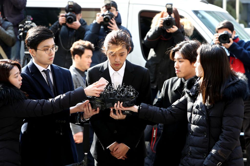 SEOUL, SOUTH KOREA - MARCH 14: Singer Jung Joon-young is seen arriving at a Seoul Metropolitan Police Agency on March 14, 2019 in Seoul, South Korea. Jung Joon-young, a South Korean singer-songwriter and TV celebrity appeared at the police station on Thursday to be questioned over suspicions of sharing sexual videos in a group chat which included BIGBANG's member Seungri, who is facing charges of supplying prostitution services. (Photo by Chung Sung-Jun/Getty Images)