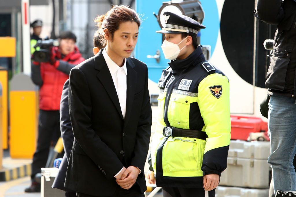 SEOUL, SOUTH KOREA - MARCH 14: Singer Jung Joon-young is seen arriving at a Seoul Metropolitan Police Agency on March 14, 2019 in Seoul, South Korea. Jung Joon-young, a South Korean singer-songwriter and TV celebrity appeared at the police station on Thursday to be questioned over suspicions of sharing sexual videos in a group chat which included BIGBANG's member Seungri, who is facing charges of supplying prostitution services. (Photo by Chung Sung-Jun/Getty Images)