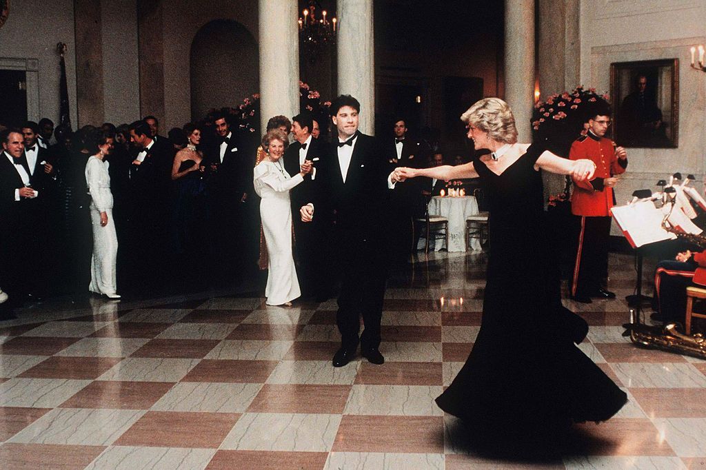 WASHINGTON, UNITED STATES - NOVEMBER 09: (FILE PHOTO) Diana, Princess Of Wales, watched by President Ronald Reagan and wife Nancy, dances with John Travolta at the White House, USA on November 9, 1985. Diana is wearing a midnight blue velvet dress by designer Victor Edelstein. (Photo by Anwar Hussein/WireImage) On July 1st Diana, Princess Of Wales would have celebrated her 50th Birthday Please refer to the following profile on Getty Images Archival for further imagery. https://www.gettyimages.co.uk/Search/Search.aspx?EventId=107811125&EditorialProduct=Archival For further images see also: Princess Diana: https://www.gettyimages.co.uk/Account/MediaBin/LightboxDetail.aspx?Id=17267941&MediaBinUserId=5317233 Following Diana's Death: https://www.gettyimages.co.uk/Account/MediaBin/LightboxDetail.aspx?Id=18894787&MediaBinUserId=5317233 Princess Diana - A Style Icon: https://www.gettyimages.co.uk/Account/MediaBin/LightboxDetail.aspx?Id=18253159&MediaBinUserId=5317233