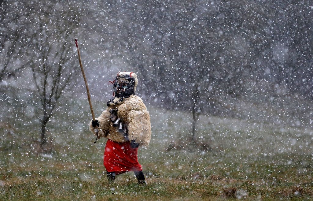A reveller dressed as devil walks through the village of Valasska Polanka during a traditional Saint Nicholas parade near the town of Vsetin, Czech Republic, December 7, 2019. REUTERS/David W Cerny