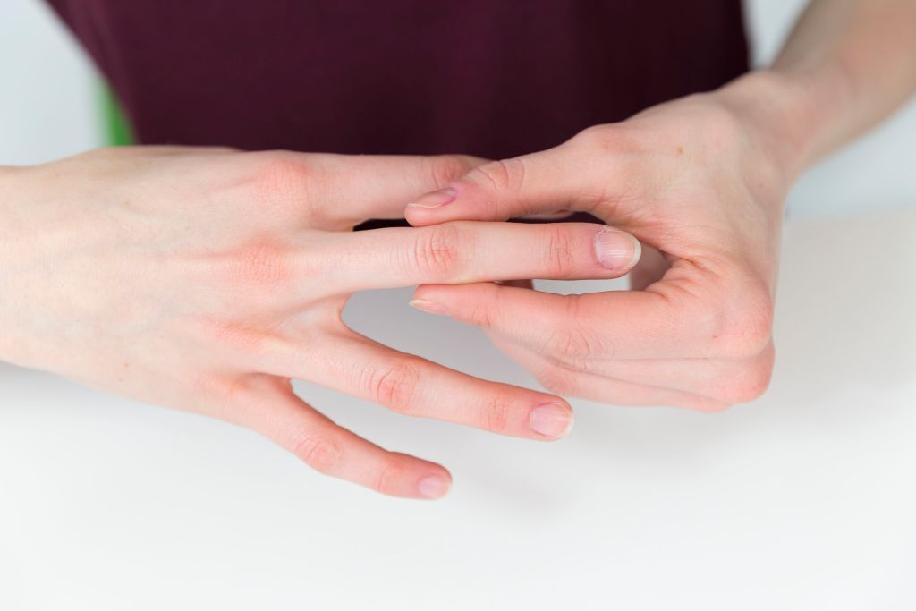 Woman suffering from finger pain. (Photo by: BSIP/Universal Images Group via Getty Images)