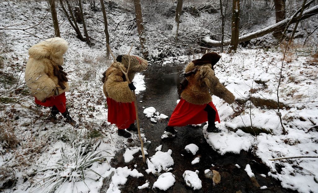 Revellers dressed as devils walk through the village of Valasska Polanka during a traditional Saint Nicholas parade near the town of Vsetin, Czech Republic, December 7, 2019. REUTERS/David W Cerny