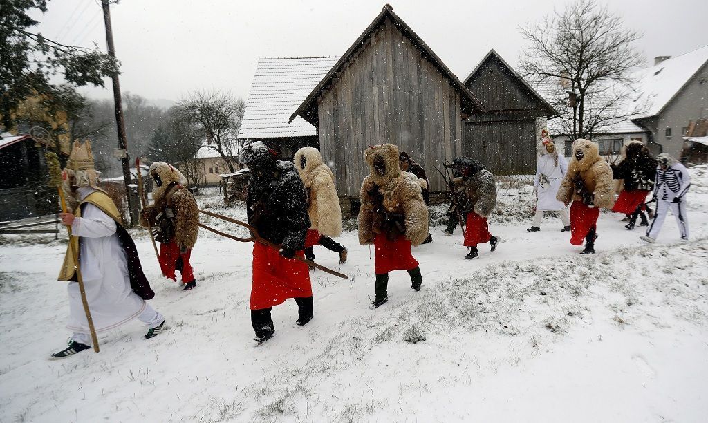 Revellers dressed as devils walk through the village of Valasska Polanka during a traditional Saint Nicholas parade near the town of Vsetin, Czech Republic, December 7, 2019. REUTERS/David W Cerny