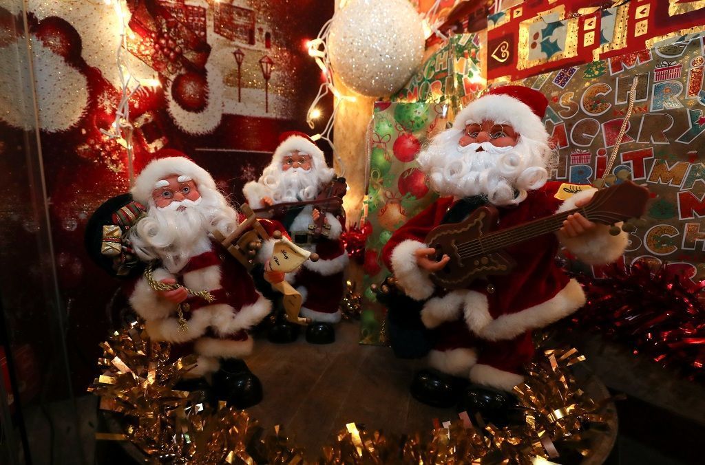 Christmas decorations are seen in the garden that belongs to Serge Hennebel, nicknamed "Elf Serge", and has been transformed into a Christmas village adorned with hundreds of lights, in Hamme-Mille, Belgium December 7, 2019  REUTERS/Yves Herman