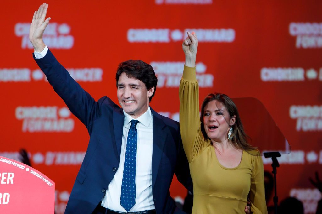 MONTREAL, QC - OCTOBER 21: Liberal Leader and Canadian Prime Minister Justin Trudeau waves alongside his wife Sophie Grégoire Trudeau after delivering his victory speech at his election night headquarters on October 21, 2019 in Montreal, Canada. Trudeau remains in power with a Minority Government. (Photo by Cole Burston/Getty Images)
