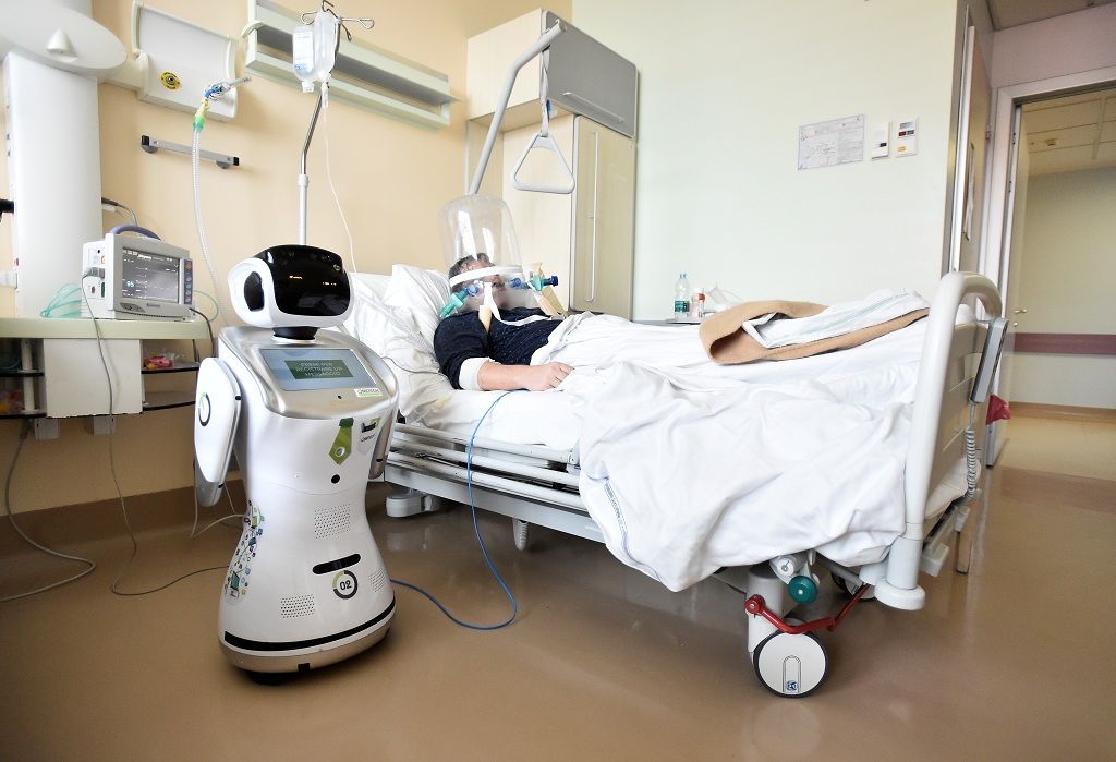 A robot helping medical teams treat patients suffering from the coronavirus disease (COVID-19) is pictured at a patient's room, in the Circolo hospital, in Varese, Italy April 1, 2020. REUTERS/Flavio Lo Scalzo