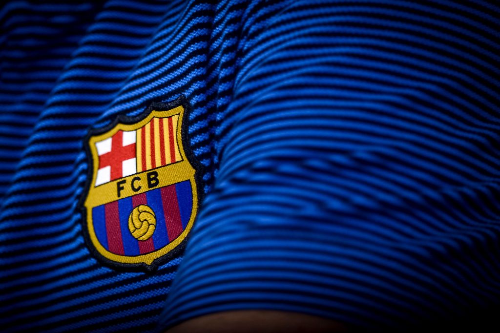 JUVENTUS STADIUM, TURIN, ITALY - 2017/11/21: The logo of FC Barcelona is pictured during FC Barcelona press conference on the eve of the UEFA Champions League football match between Juventus FC and FC Barcelona. (Photo by Nicolò Campo/LightRocket via Getty Images)