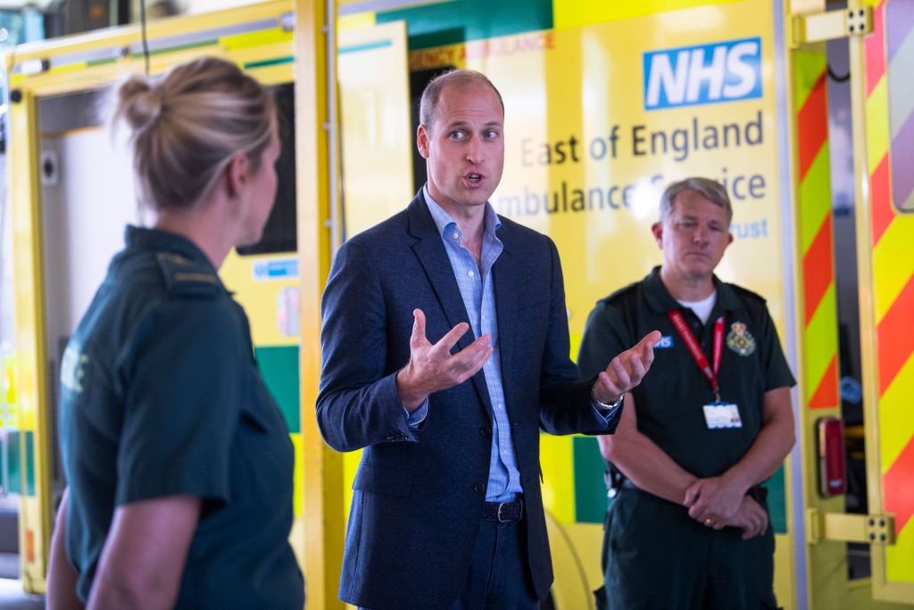 KING'S LYNN, ENGLAND - JUNE 16: Prince William, Duke of Cambridge meets paramedic staff, maintaining social distancing, from the East of England Ambulance Service Trust during a visit to the Ambulance Station on June 16, 2020 in King's Lynn, England. The purpose of the visit was to thank staff from the East of England Ambulance Service Trust for their work and dedication responding to the COVID-19 outbreak. (Photo by Victoria Jones-WPA Pool/Getty Images)