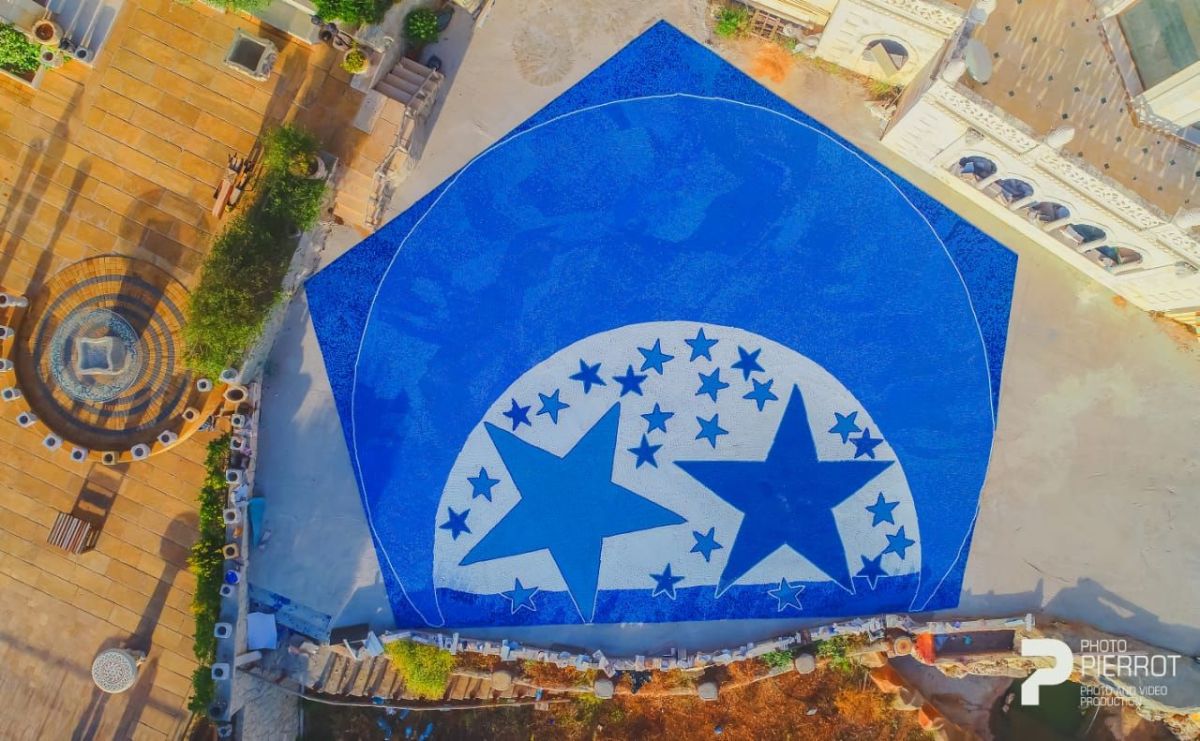 بعدما هزمت اليابان ومكسيكو.. لبنانية تدخل ”غينيس“ للمرة الـ3 بأكبر علم لبناني