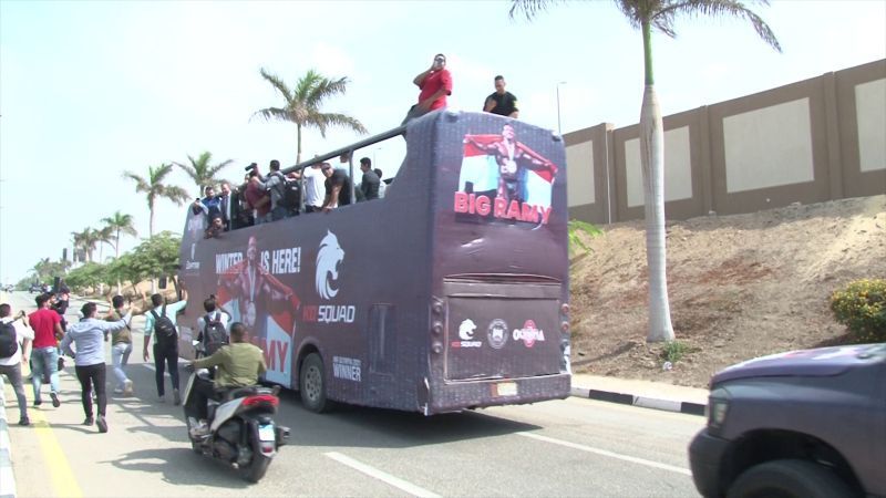 بيج رامي" يصل القاهرة متوجا بمستر أولمبيا وسط استقبال رسمي وشعبي" 1 بيج رامي" يصل القاهرة متوجا بمستر أولمبيا وسط استقبال رسمي وشعبي"