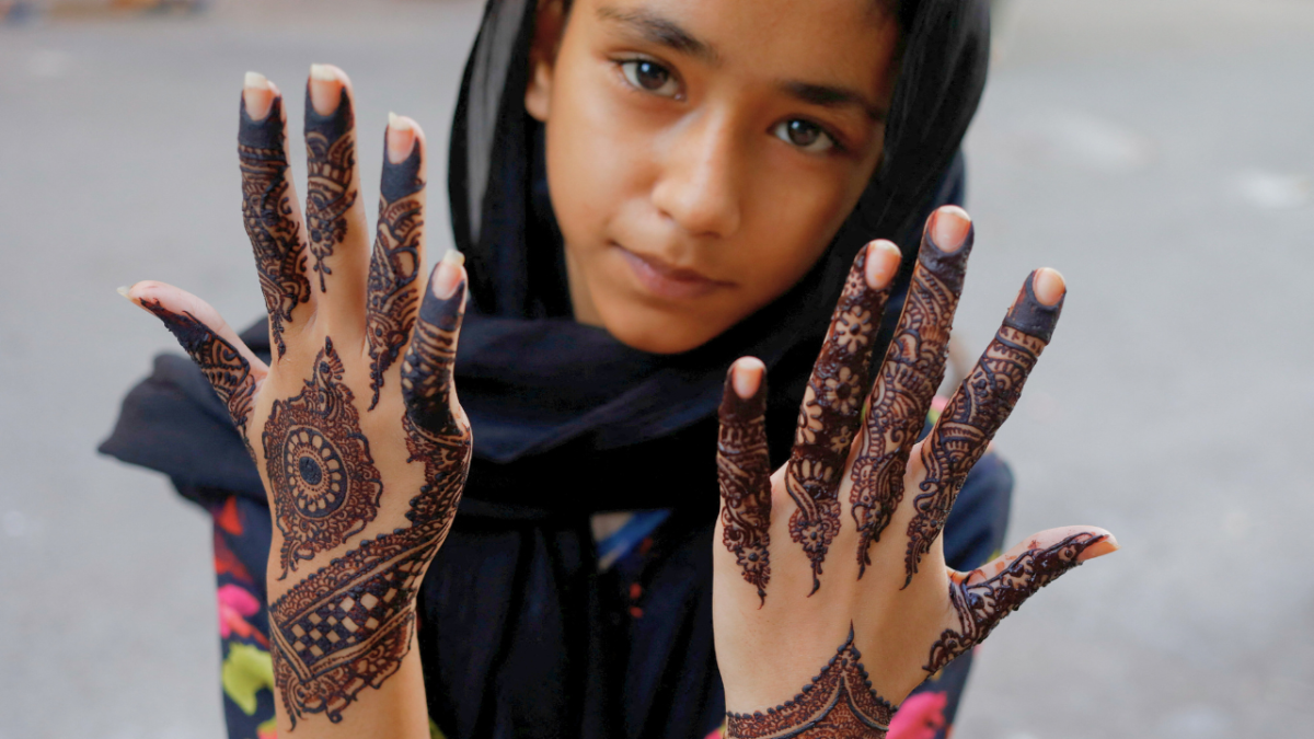 بالصور.. ملامح الفرحة تٌرسم على وجوه الأطفال في عيد الفطر