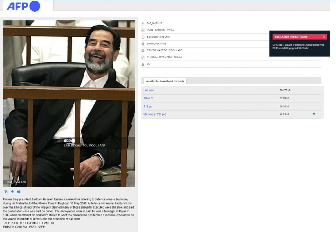 صورة لصدام حسين وهو يضحك لحظة صدور حكم الإعدام بحقه.. ما صحتها؟