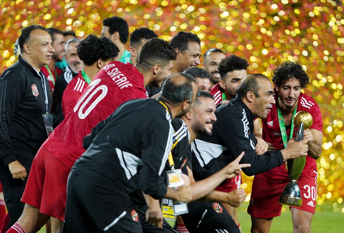 Soccer Football - CAF Champions League - Final - Second leg - Wydad AC v Al Ahly SC - Mohammed V Stadium, Casablanca, Morocco - June 11, 2023 Al Ahly SC players celebrate with the trophy after winning the CAF Champions League REUTERS/Abdelhak Balhaki