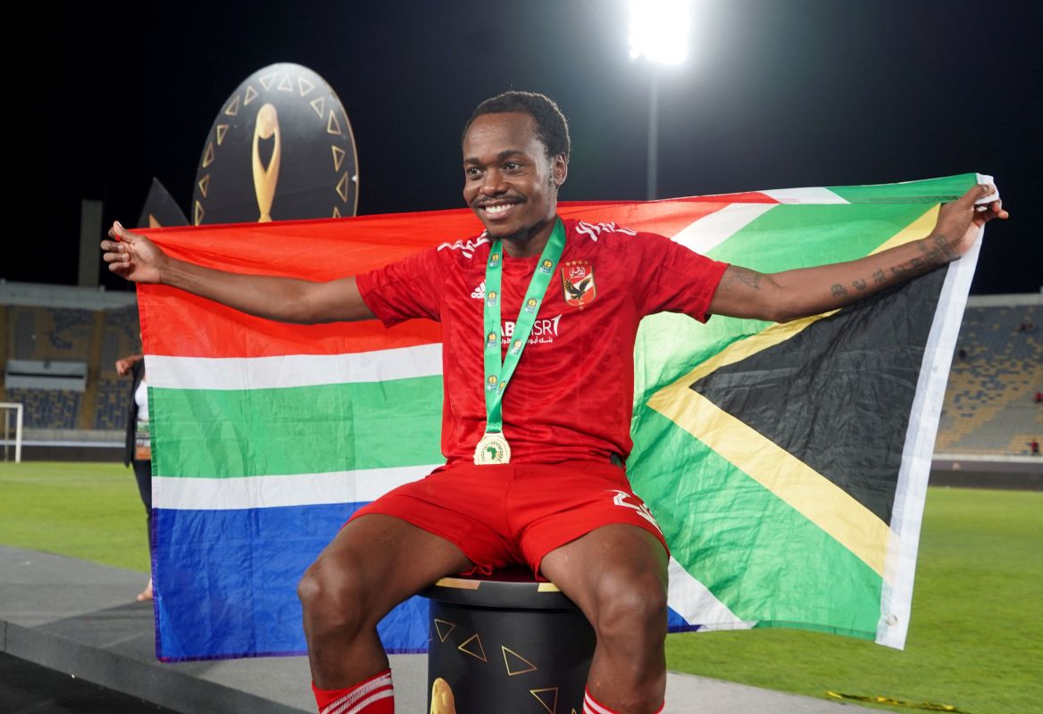 Soccer Football - CAF Champions League - Final - Second leg - Wydad AC v Al Ahly SC - Mohammed V Stadium, Casablanca, Morocco - June 11, 2023 Al Ahly SC's Percy Tau celebrates winning the CAF Champions League REUTERS/Abdelhak Balhaki