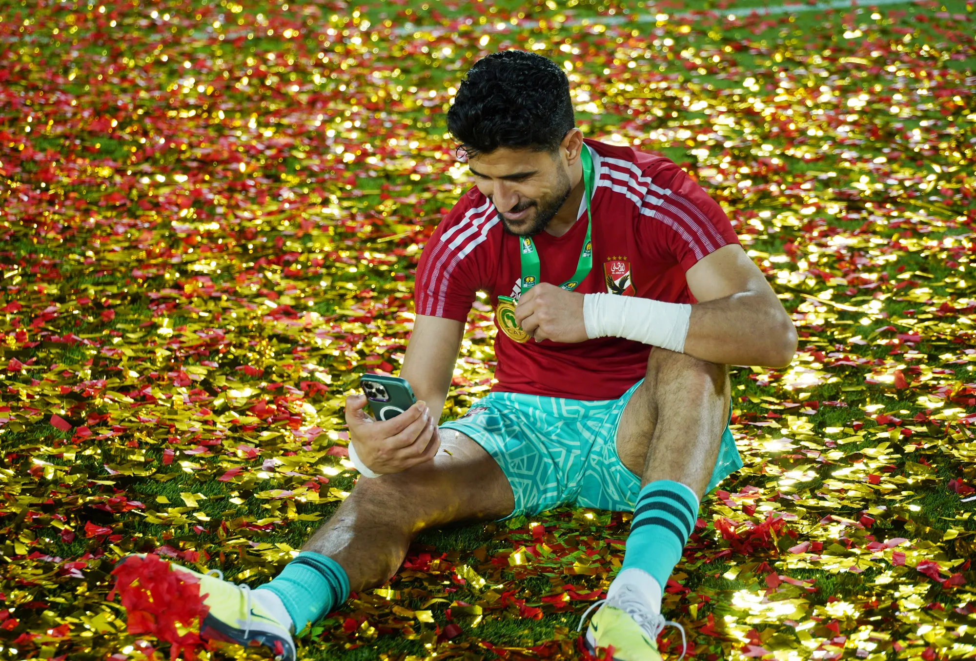 Soccer Football - CAF Champions League - Final - Second leg - Wydad AC v Al Ahly SC - Mohammed V Stadium, Casablanca, Morocco - June 11, 2023 Al Ahly SC's Ali Lotfi celebrates winning the CAF Champions League REUTERS/Abdelhak Balhaki
